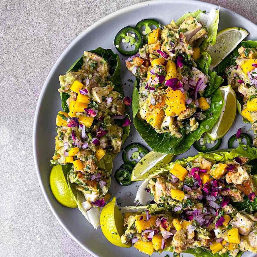A close up of the grilled chicken and mango guacamole lettuce cups.