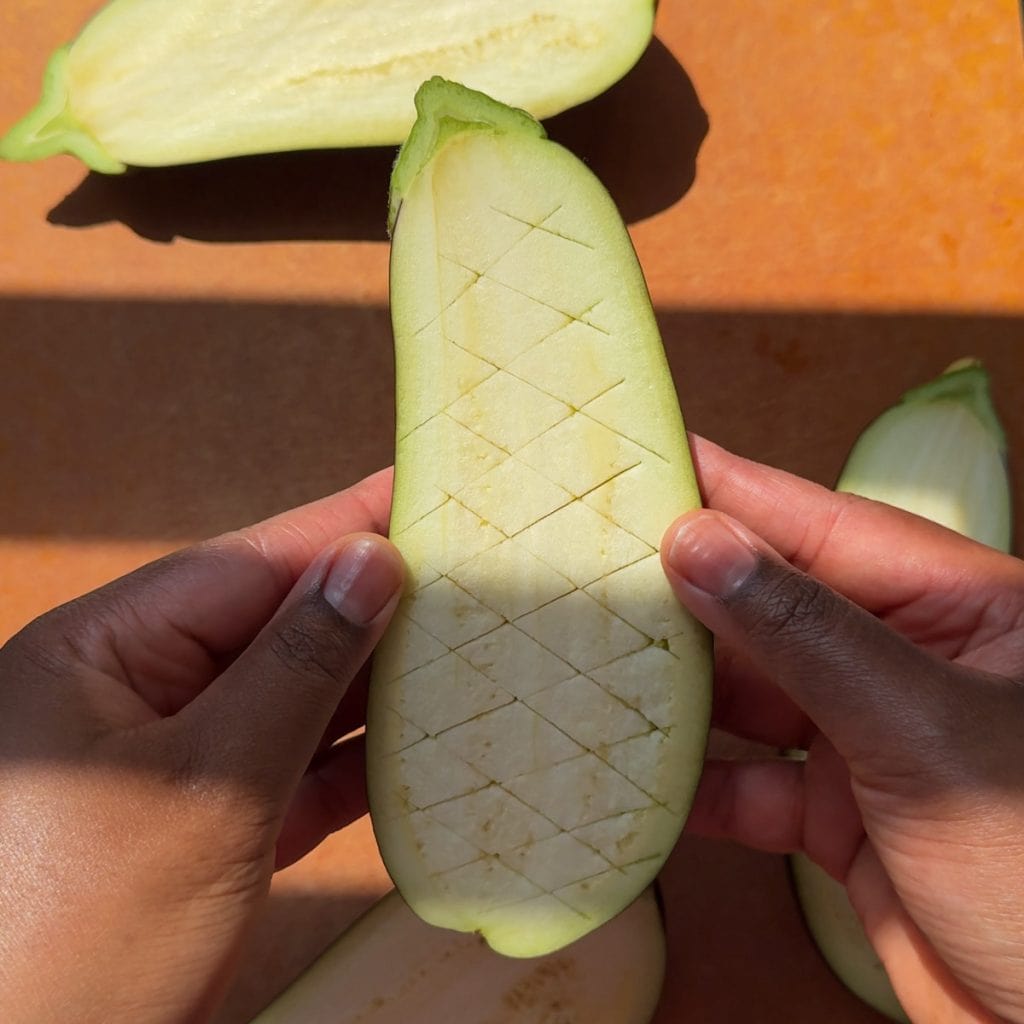 scoring the aubergines