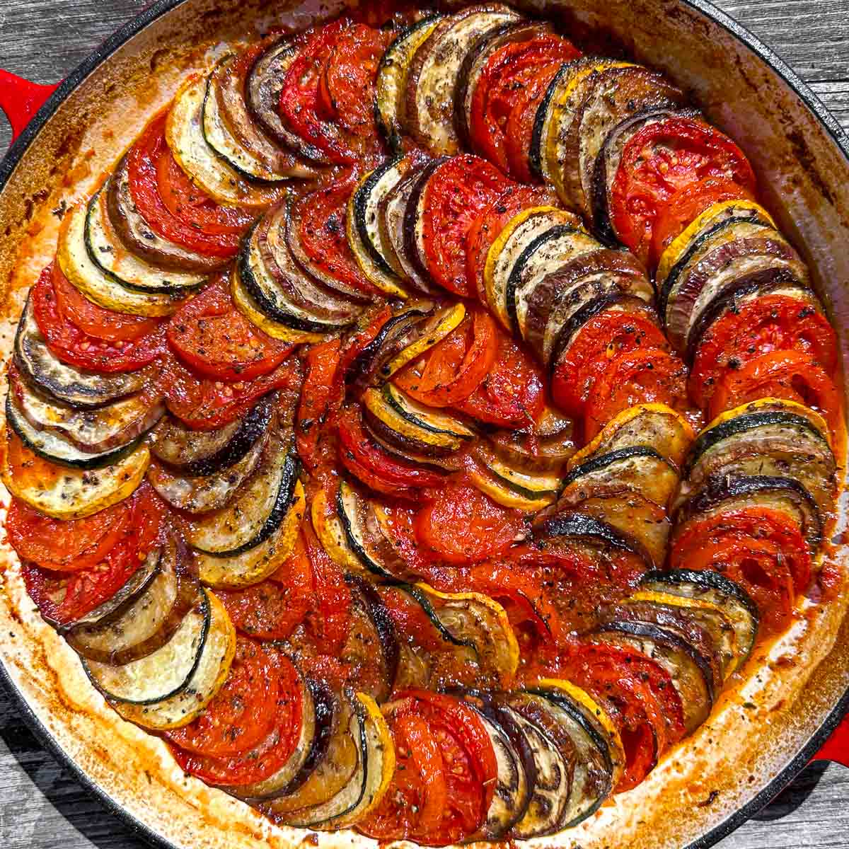 Layered ratatouille, served in a shallow casserole.