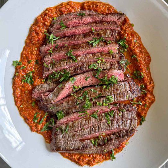 Marinated flank steak, cooked medium-rare and served over a cheat's muhammara.