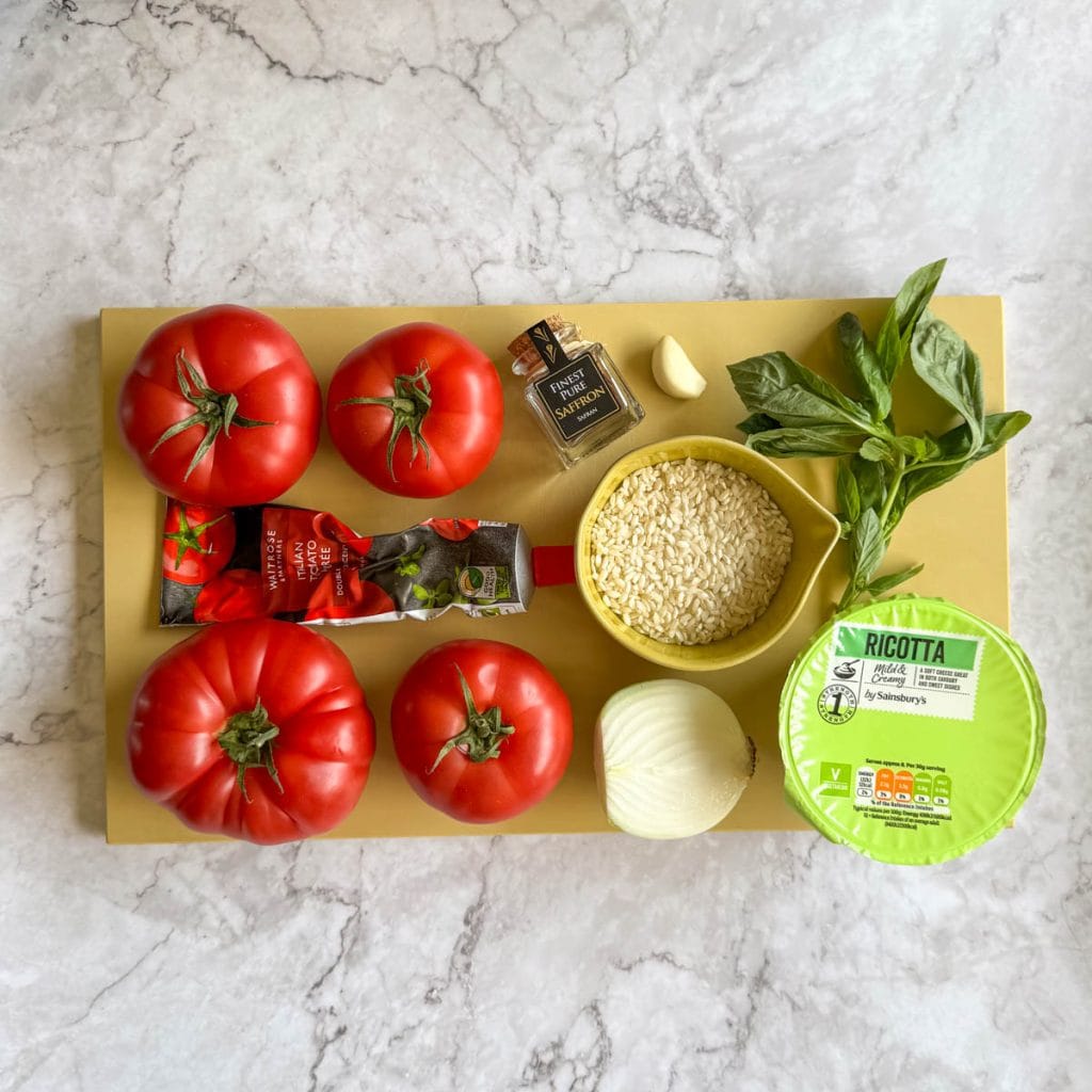 These are the ingredients required to make these rice stuffed tomatoes.