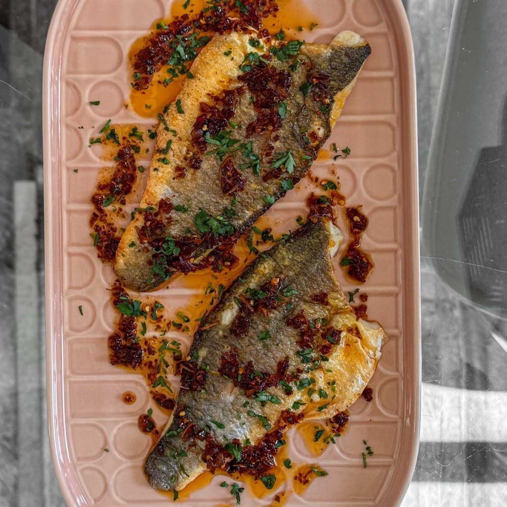 Crispy sea bass fillet topped with glossy chilli and lemongrass sauce.