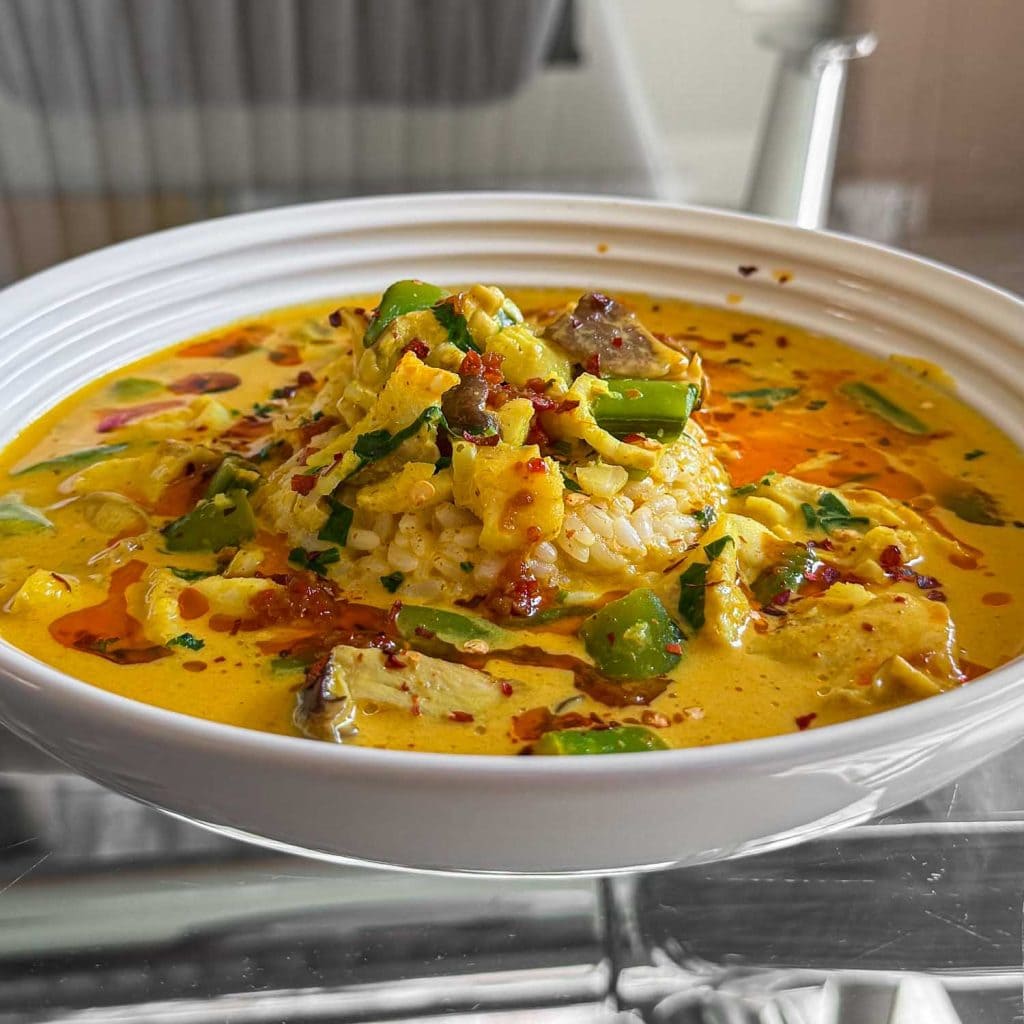 Thai curry fish soup, served over rice.
