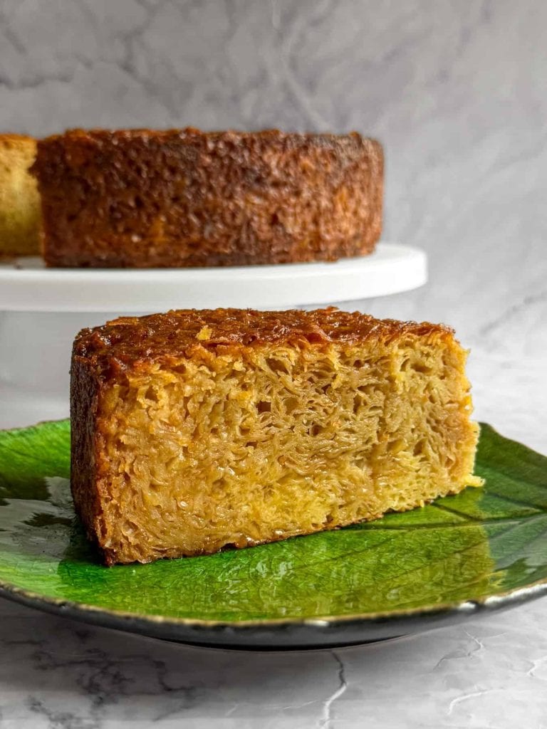 A slide on shot of a slice of greek orange and earl grey filo cake.