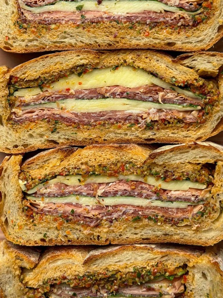 Homemade muffuletta sandwich cut into slices