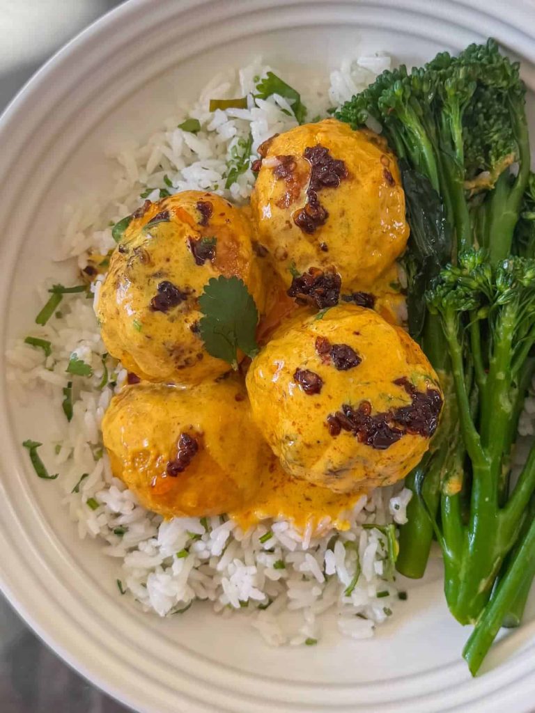 Thai curry chicken meatballs, served with coriander lime rice and broccoli