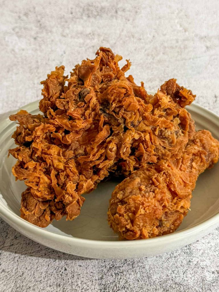 A closeup of the crispy, craggy fried chicken