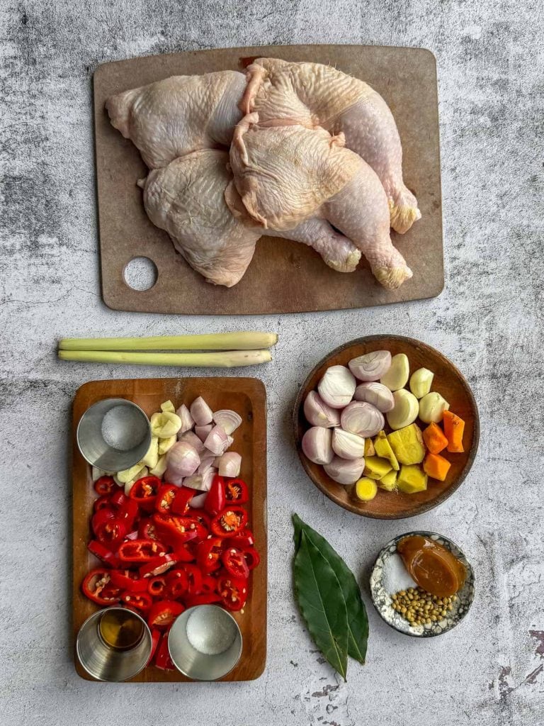 Chicken legs, shallots, turmeric and other ingredients