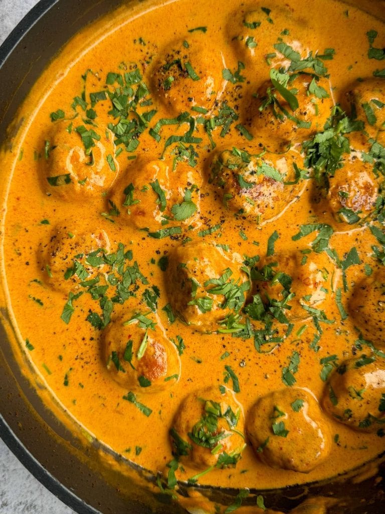 Coconut harissa chicken meatballs, straight off the hob.